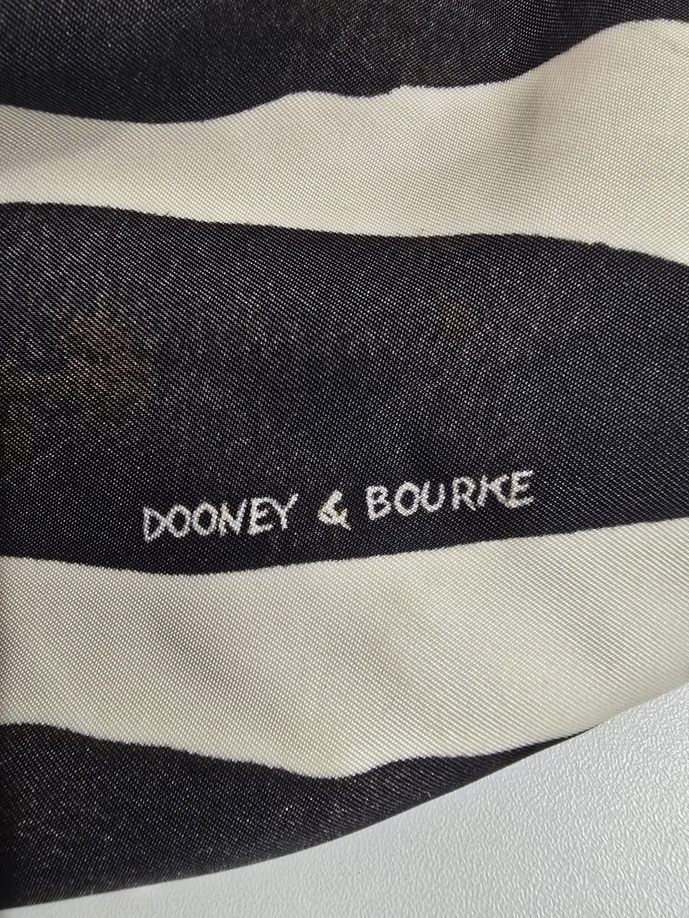 Dooney & Bourke Black and White Zebra Stripe Tote with Brown Leather Handles